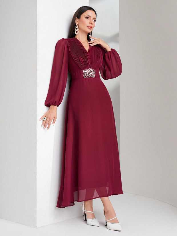 Modelyn lantern-sleeve dress in burgundy red with pearl and rhinestone details.